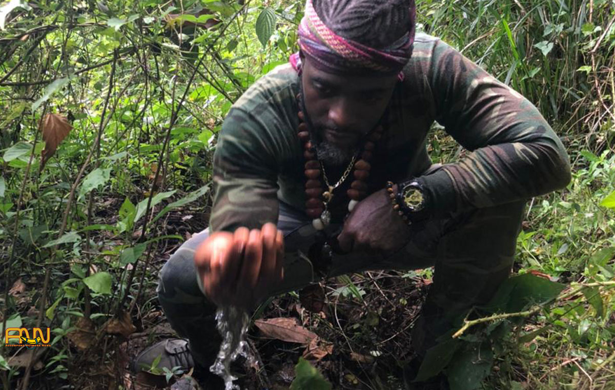 Chief Richard Currie continues to tour water resources in Accompong.